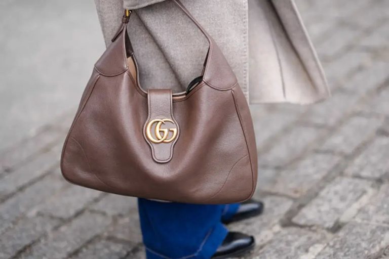 Wife defended after questioning whether husband gifted her fake Gucci bag