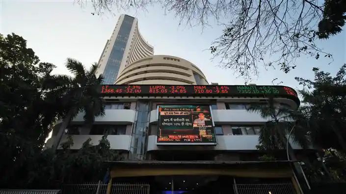 Stock markets settle flat in volatile trade ahead of RBI’s interest rate decision