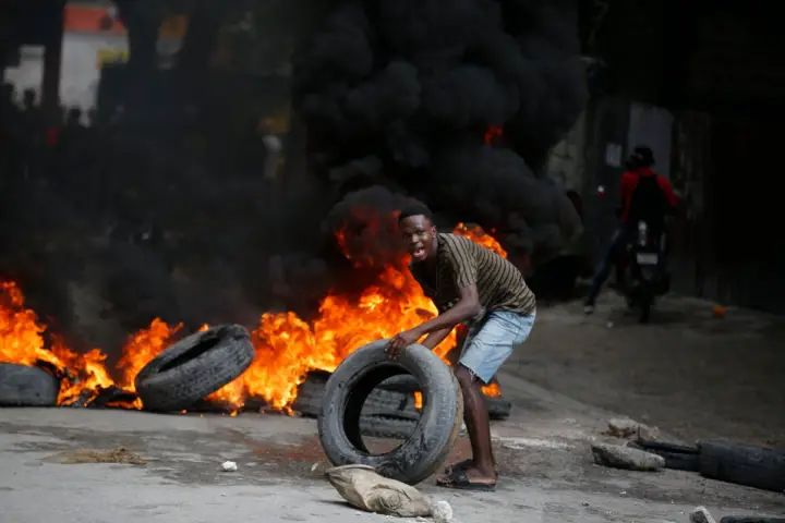 Haiti’s prime minister breaks his silence as violent protests seek his ouster