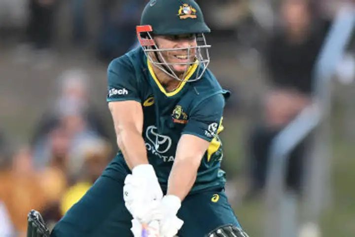 David Warner celebrates 100th T20 appearance for Australia as West Indies chase falls short