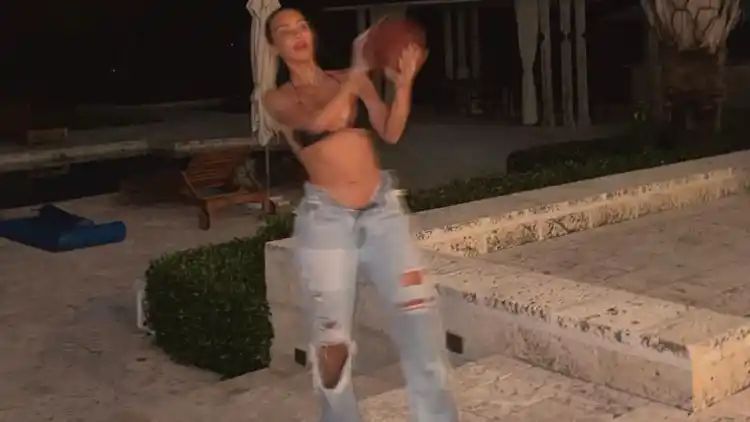 Kim Kardashian Goes Casual Glam with ‘Game Time’ Bikini Top and Jeans Outfit (View Pic)