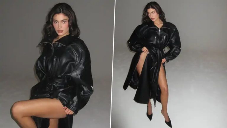 Kylie Jenner Makes a Style Statement in a Black Trench Coat With Thigh-High Slits (View Pics)