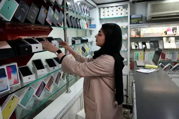 A brazen iPhone scam in Iran reflects its economic struggles and tensions with the West