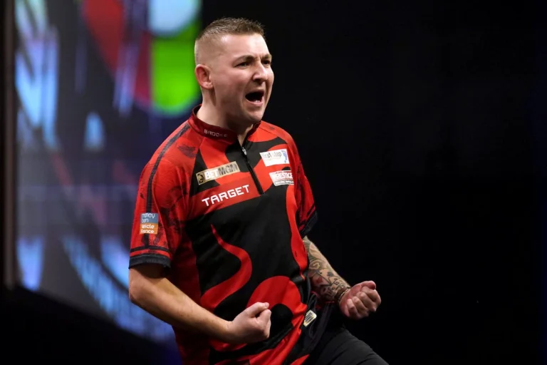 Nathan Aspinall overcomes Rob Cross to earn first Premier League darts win