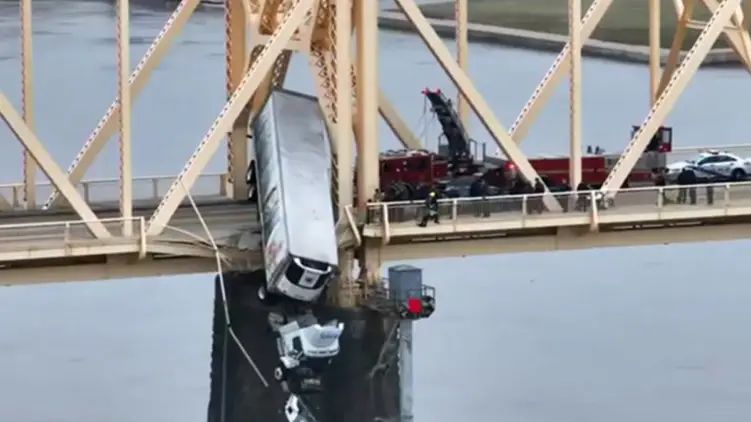 Truck dangles off Kentucky bridge forcing dramatic rescue