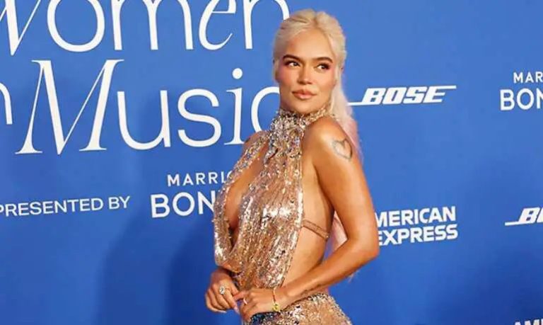 Karol G becomes first Latina to win Woman of the Year at Billboard Women in Music Awards