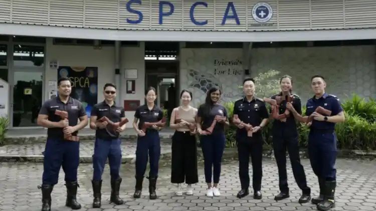 Singapore Civil Defence Donates Fire-Hose Chewy Toys To SPCA For A ‘Paw-Some Future’