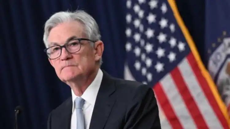 Federal Reserve holds rates steady amid high projections for 2024 rate cuts