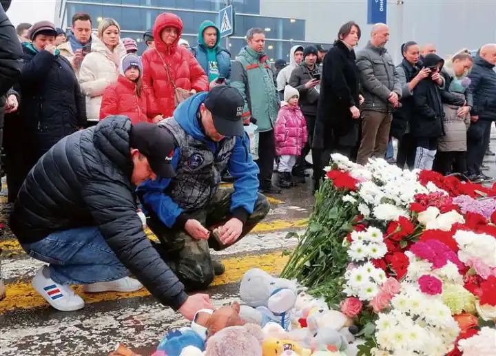 IS claims responsibility after 143 killed in Russia concert shooting; 4 gunmen held