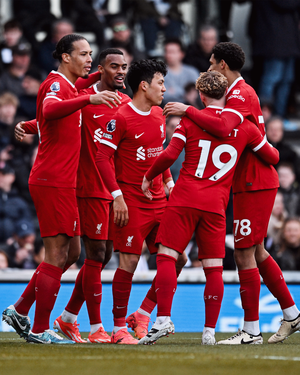 Premier League: Liverpool win at Fulham to go level with leaders Arsenal