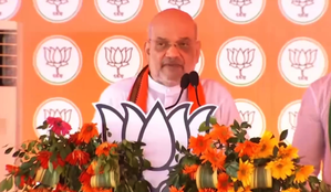 HM Amit Shah takes 'Chawal wali sarkar Vs jhole wali sarkar' jibe to target Naveen Patnaik govt