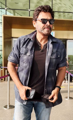 Venkatesh Daggubati aces airport look with checkered shirt and denims