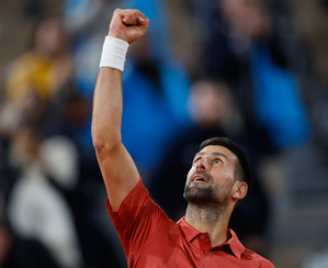 French Open: Djokovic rallies from the brink to beat Cerundolo in fourth-round classic