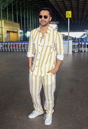 Varun Dhawan meets Maniesh Paul at airport lounge as they leave to shoot for their new project